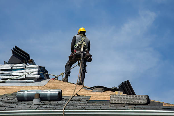 Professional Storm Damage Roof Repair technician working in Jefferson, NH